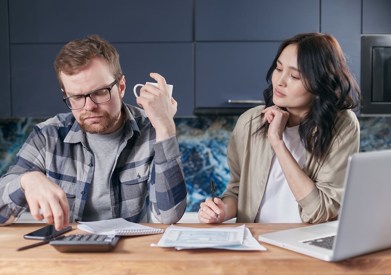 A man and a woman budgeting together.