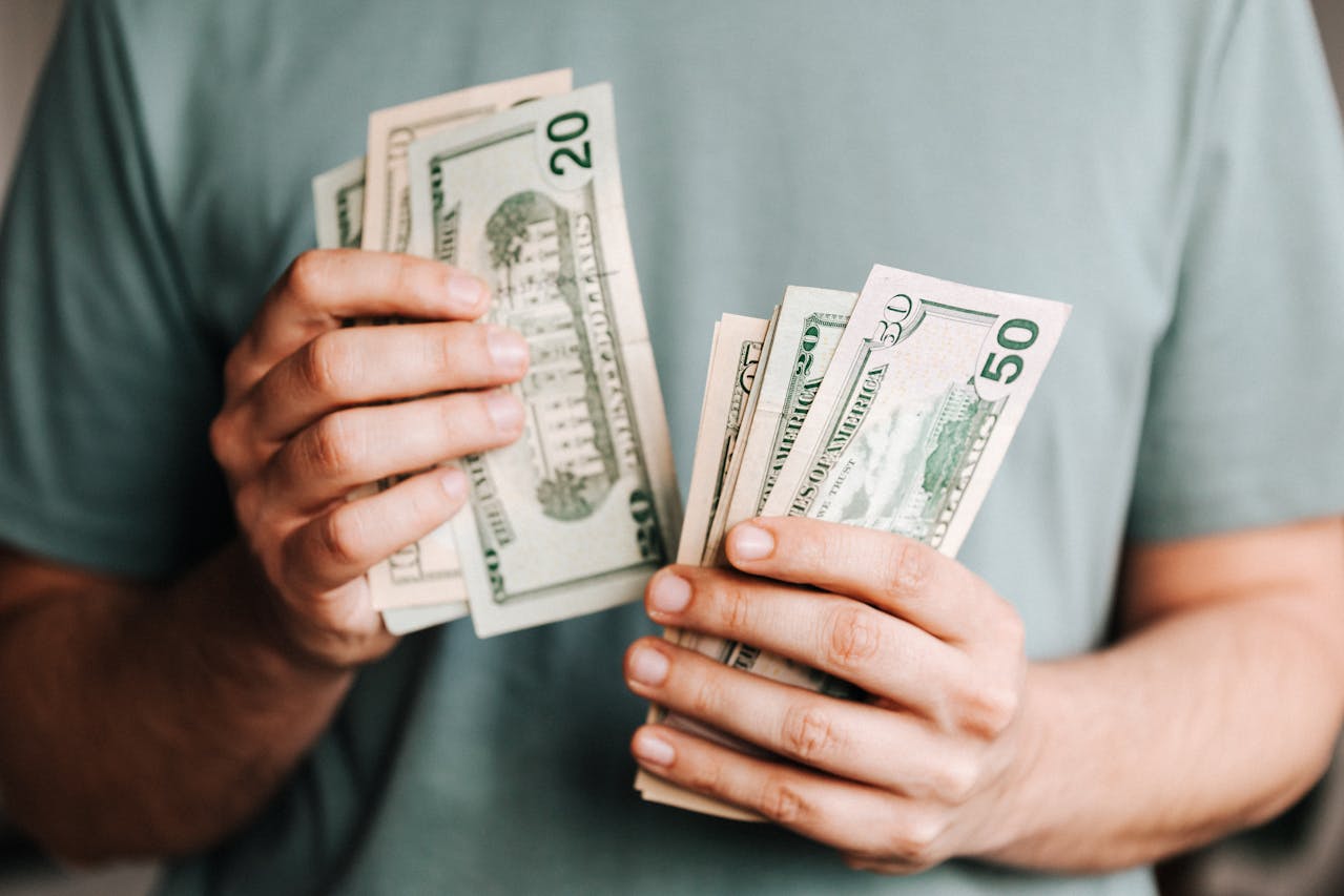 A man counting money.