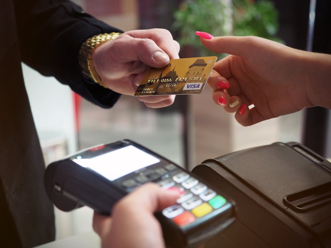 A person paying with a credit card.